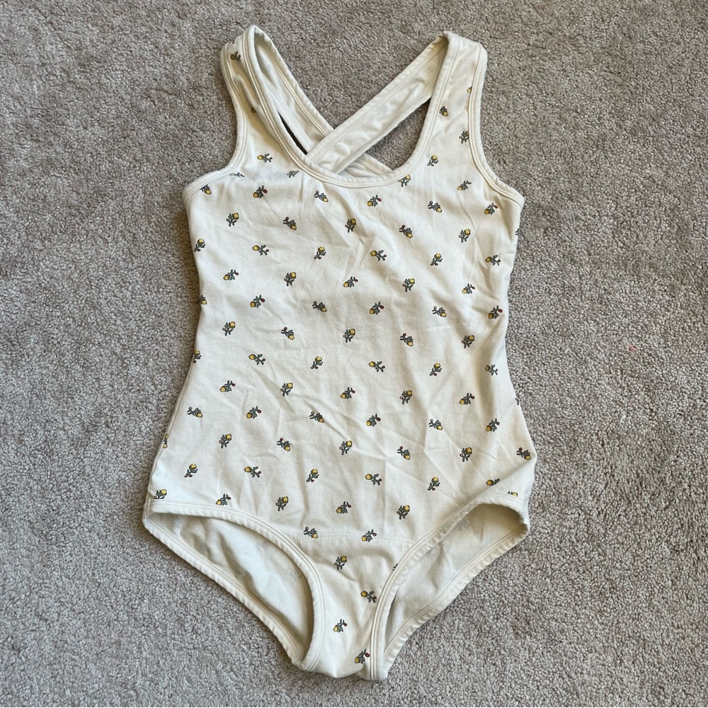 Shop Arq cleo leo floral print criss cross back bodysuit in yellow calico